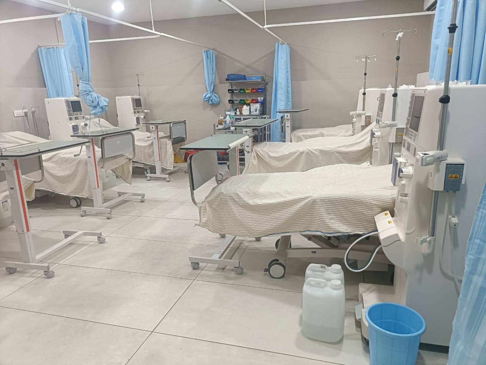 A caring nurse assisting a dialysis patient